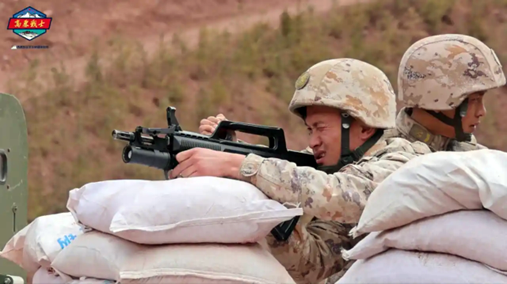 A PLA Army Tibet Military District soldier firing a QLG-10 under-barrel grenade launcher in February 2026